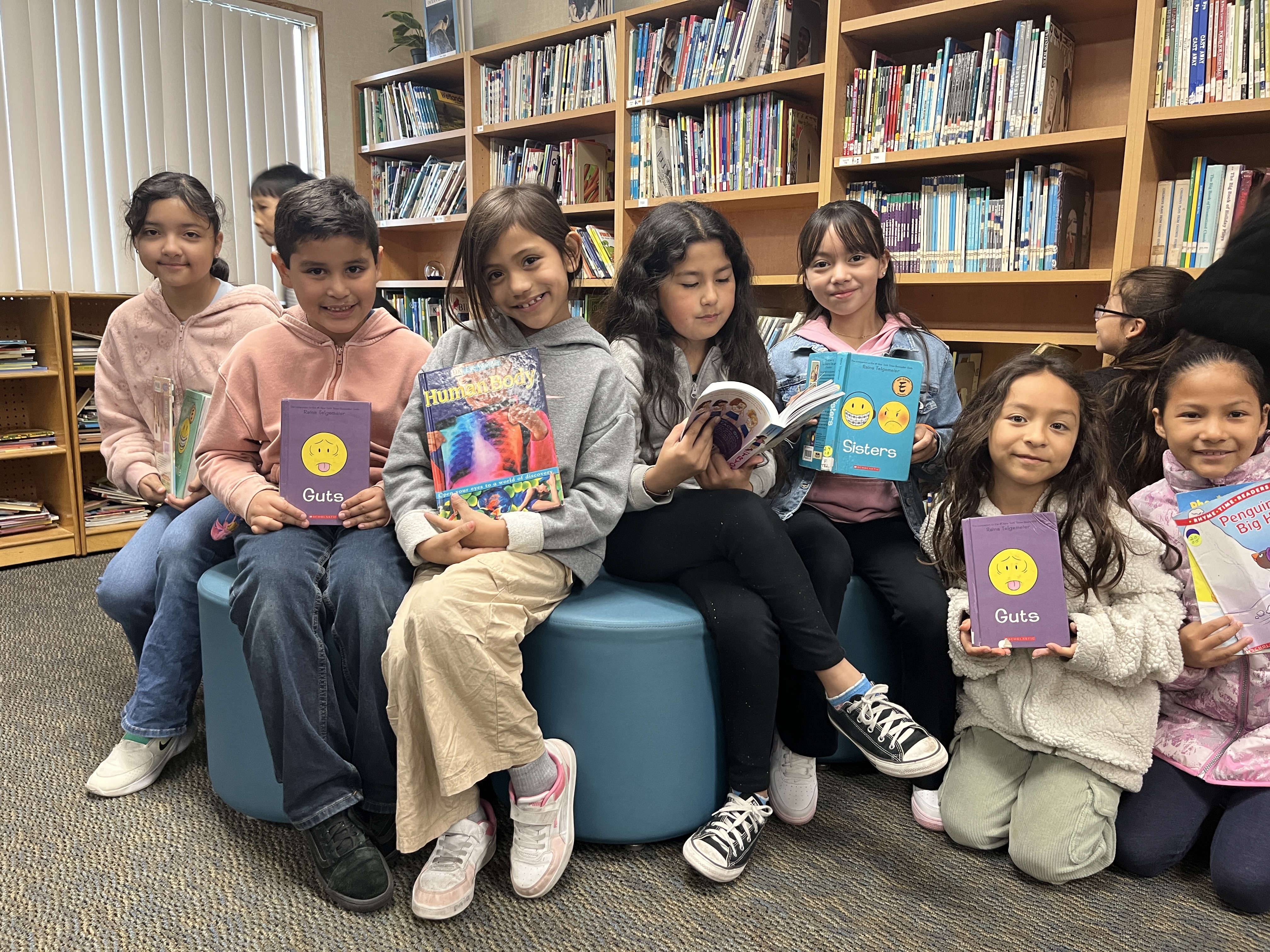 Mitchell scholars enjoying their library visit