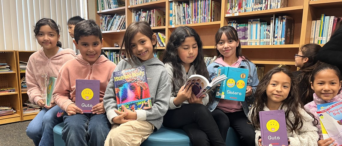 Mitchell scholars enjoying their library visit